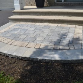 Interlock Entrance with Sodded Backyard and Fence